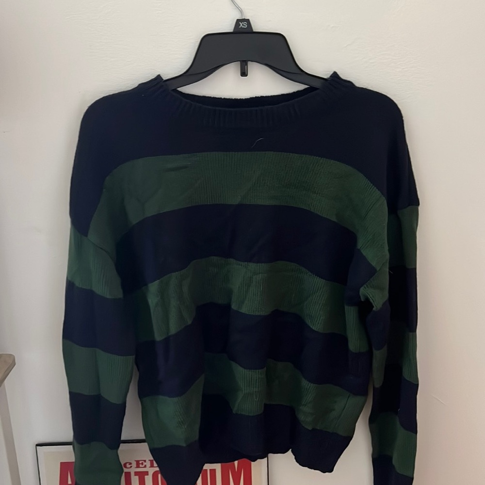 An adorable navy and green sweater. Size M-L.